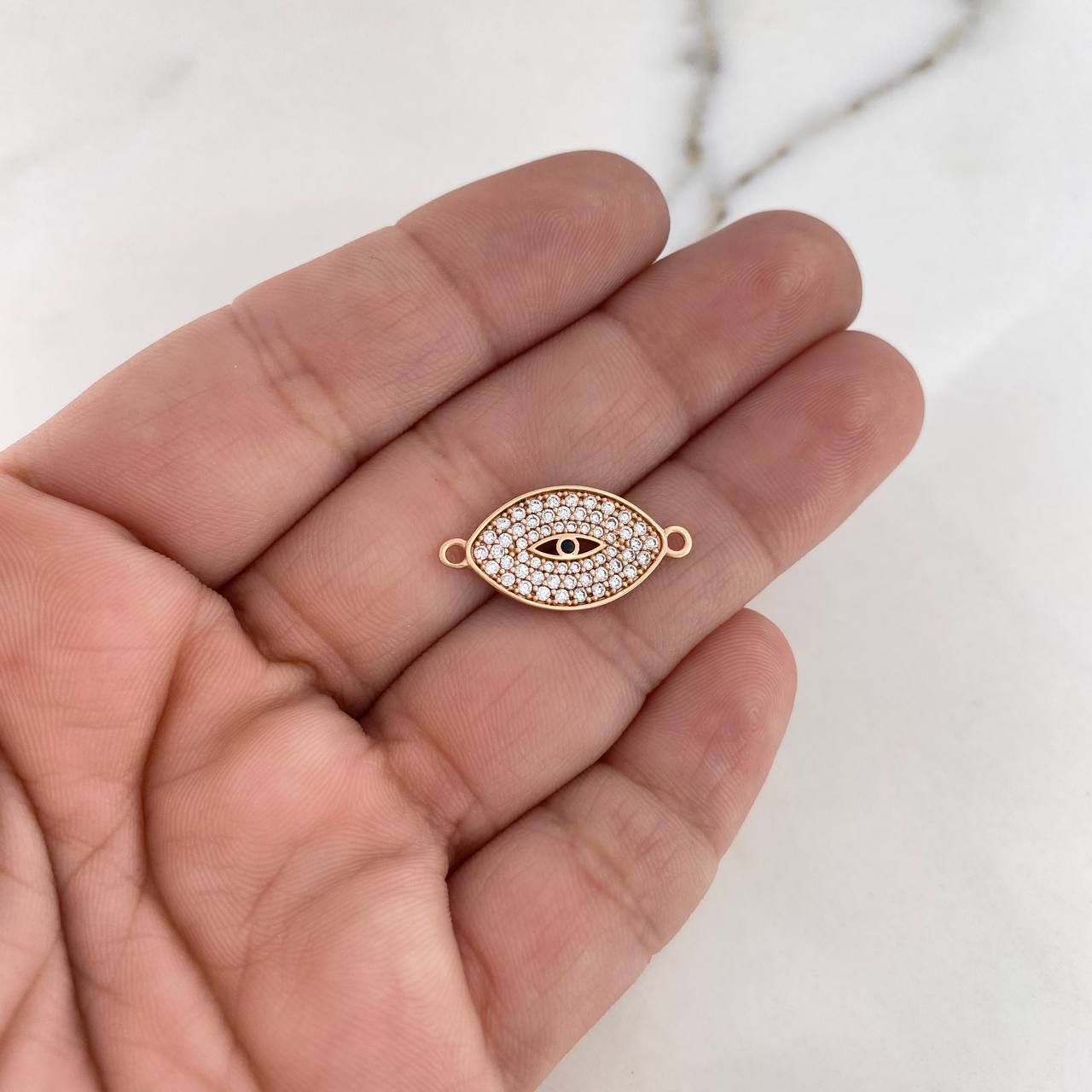 Herraje Ojo Mistico 1.75gr / 2.2cm / Circones Blancos Oro Rosa 18K $