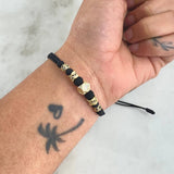 Pulsera Negra Dodecágono Cilindro Bola de Fuego 3.65gr / 8mm-5mm Circones Blancos Negros 5und Oro Amarillo 18K ©