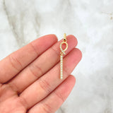 Set Lazo Cruzado 3.9gr / Topos 3cm Dije 3.7cm Circones Blancos Oro Amarillo 18K *