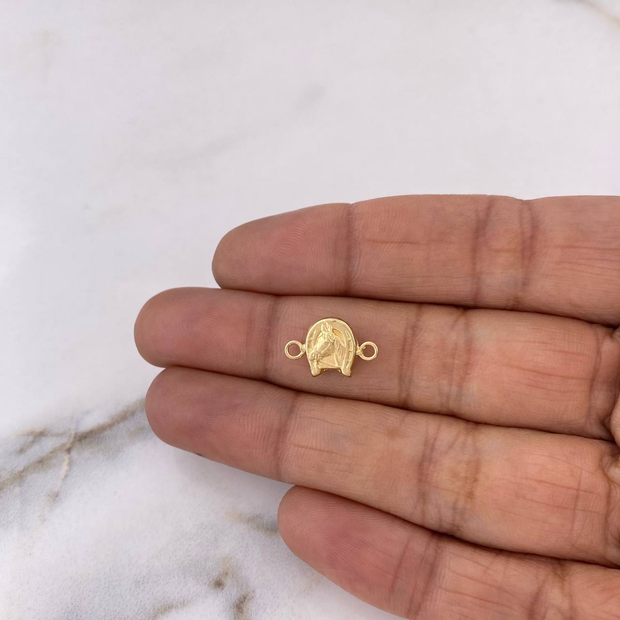 Herraje Herradura Caballo 0.4gr / 1.4cm / Oro Amarillo 18K $