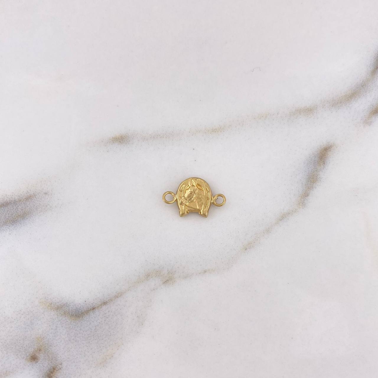Herraje Herradura Caballo 0.4gr / 1.4cm / Oro Amarillo 18K $