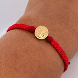 Pulsera Tejida Roja San Benito 0.7gr / Oro Amarillo 18K $