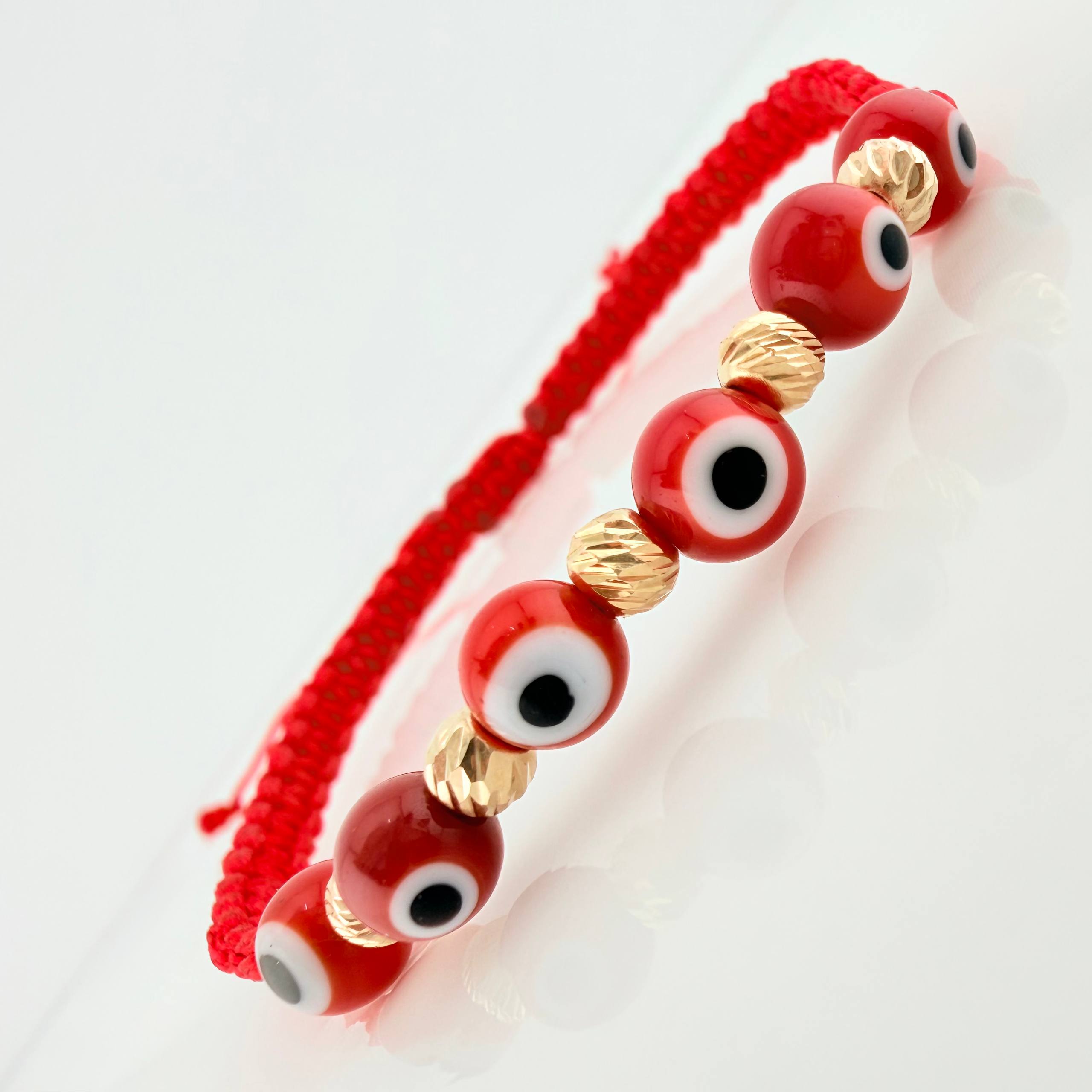 Pulsera Tejida Roja Ojos Turcos Oro Amarillo 18K