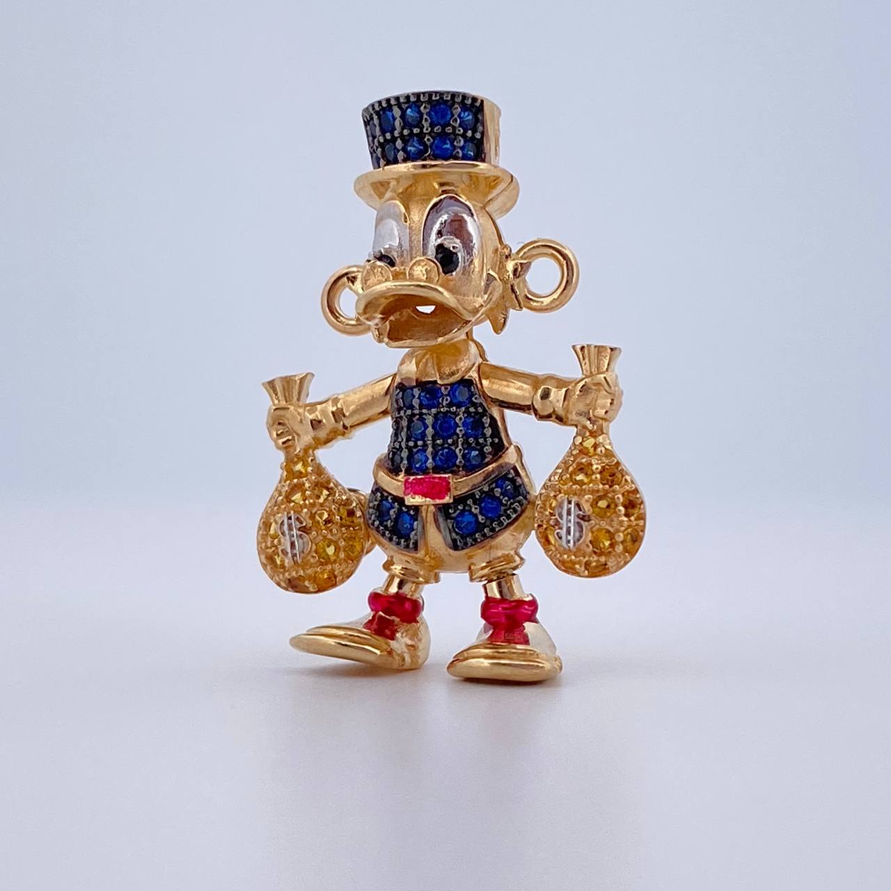Herraje Pato Bolsas Dinero 5.55gr / 2.6cm / Oro 18K $