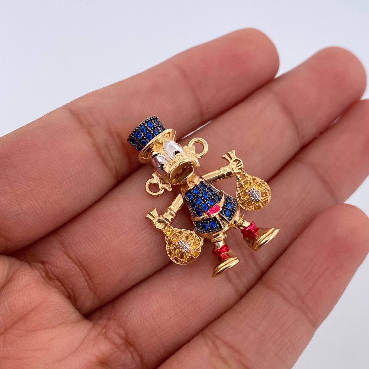 Herraje Pato Bolsas Dinero 5.55gr / 2.6cm / Oro 18K $