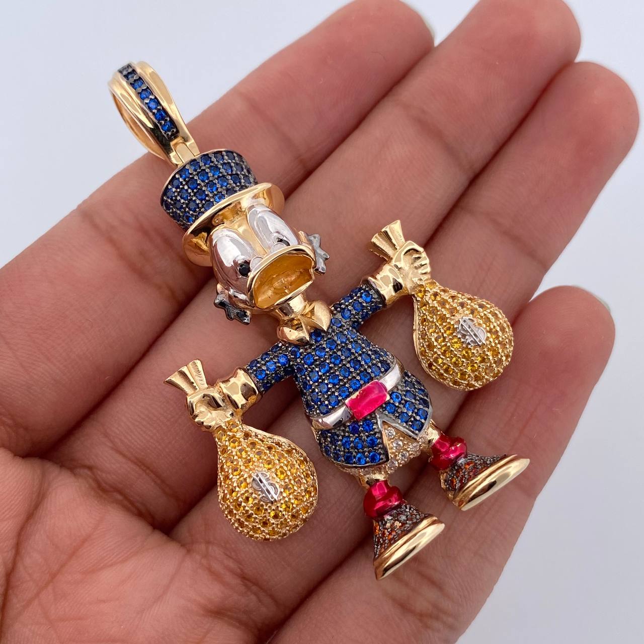 Dije Pato Bolsas Dinero 17.35gr / 5.5cm / Oro 18K $
