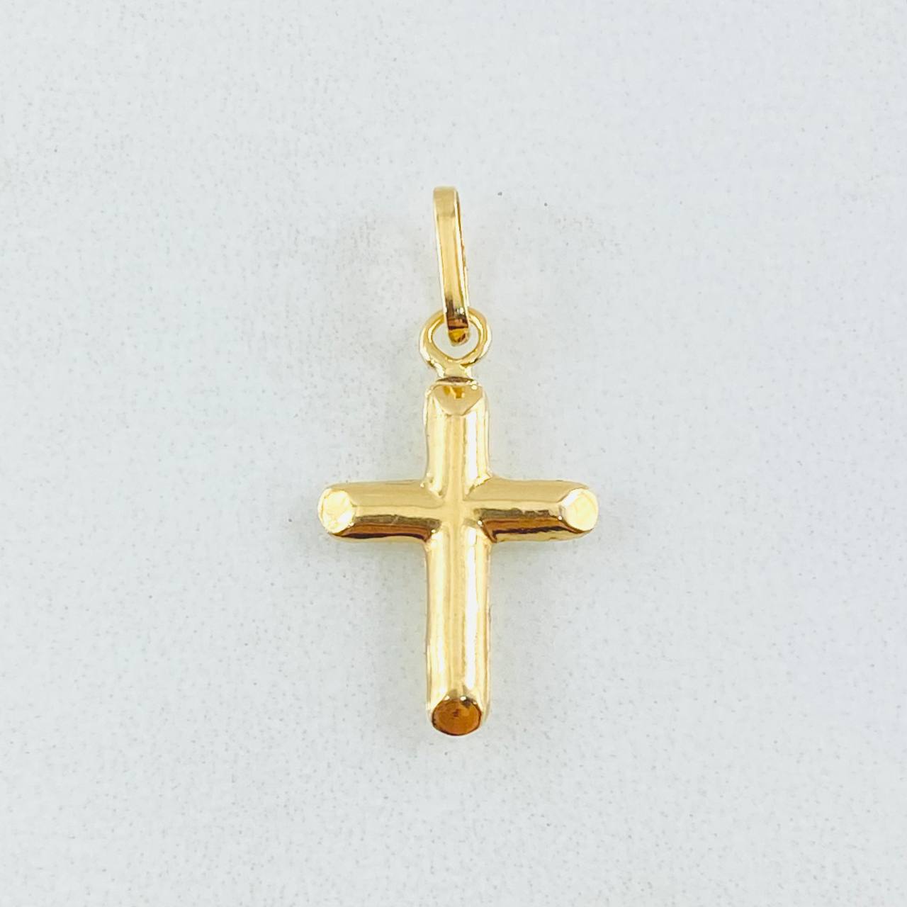 Dije Cruz 0.4gr / 2.1cm / Oro Amarillo 18K
