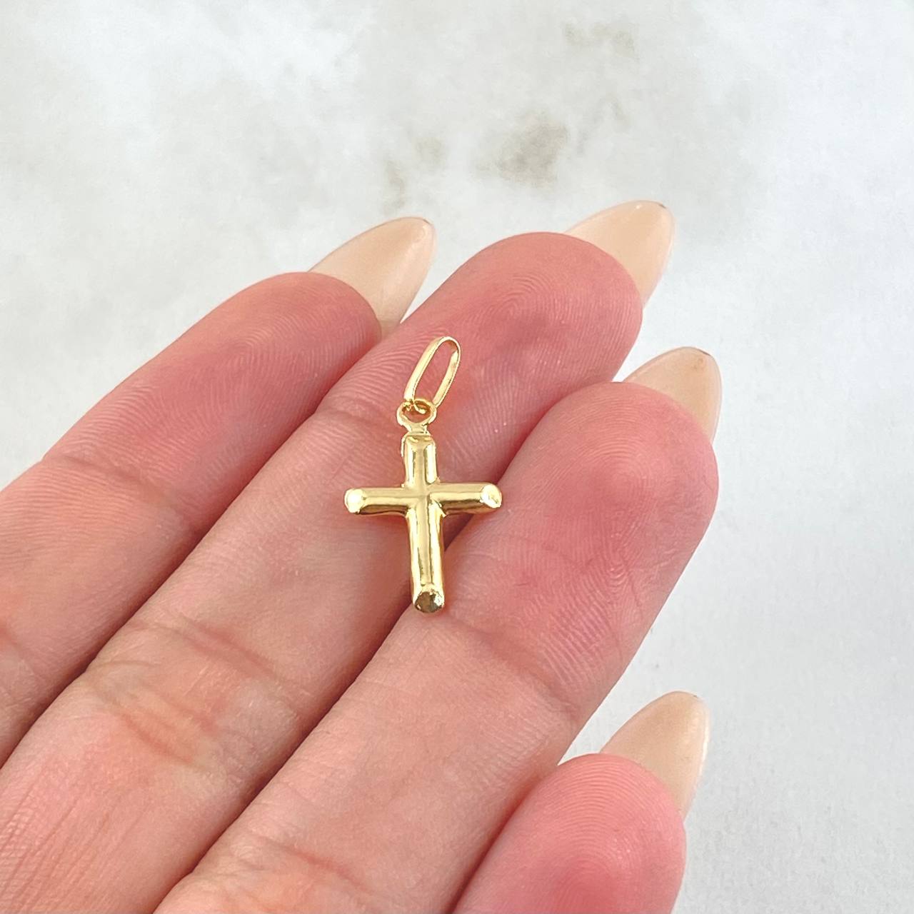 Dije Cruz 0.4gr / 2.1cm / Oro Amarillo 18K *