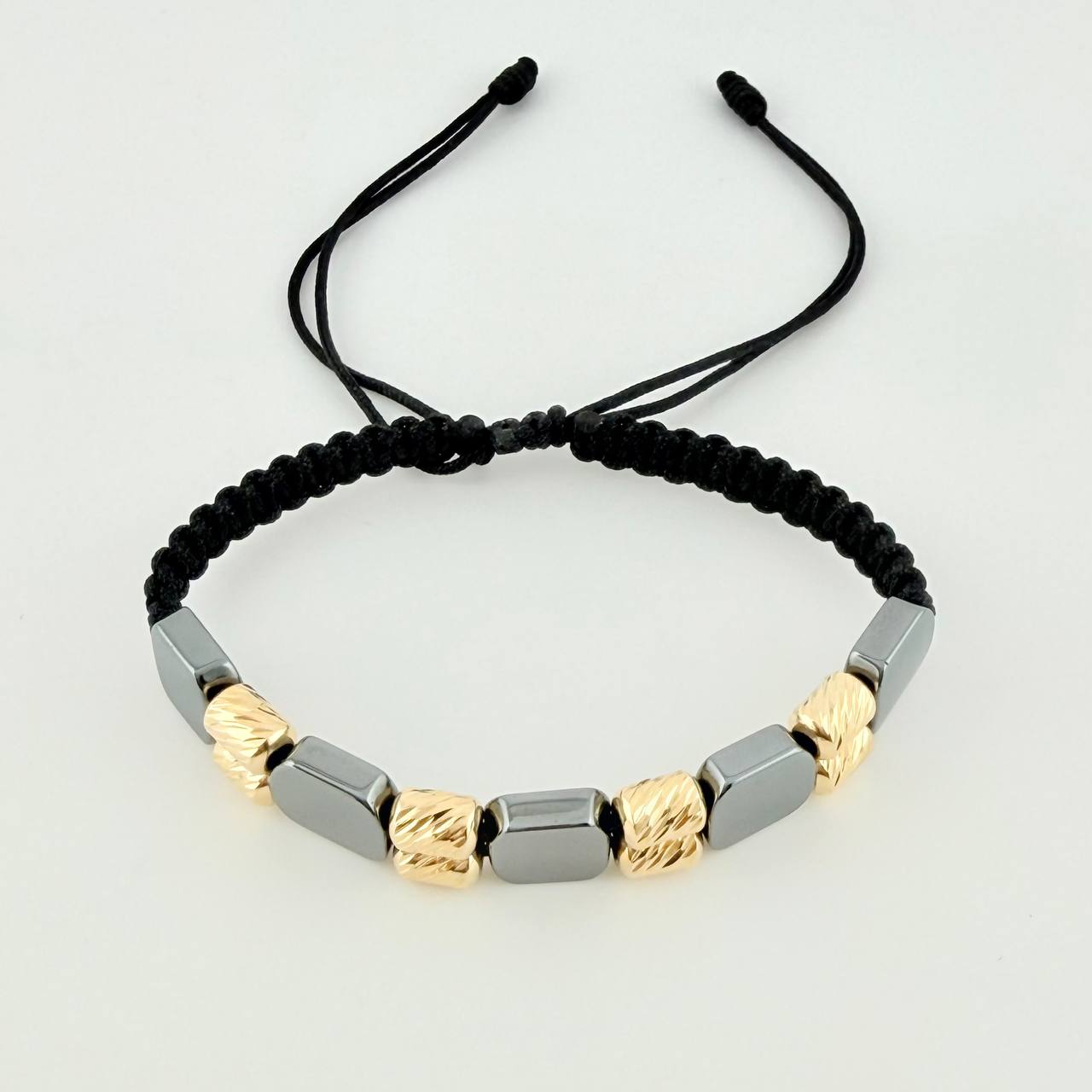 Pulsera Tejida Negra Cilindros Diamantados Piedra Hematita Oro Amarillo 18K
