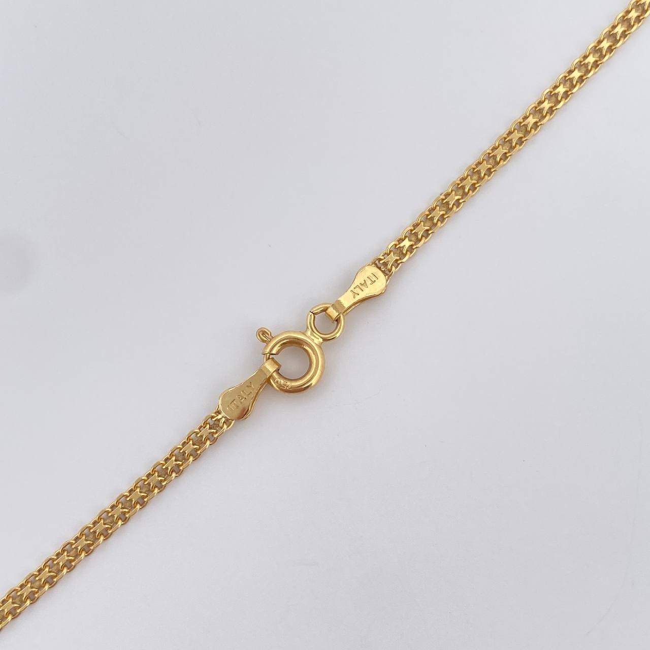 Cadena China 5.55gr / 60cm / +0 Oro 18K $