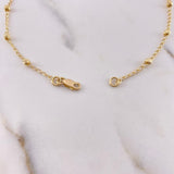 Tobillera Tipo Militar 2.2gr / 25cm / 2.8mm Bolas Diamantadas Oro Amarillo 18K $