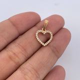 Dije Silueta Corazon 0.85gr / 1.8cm / Circones Blancos Oro Amarillo 18K &