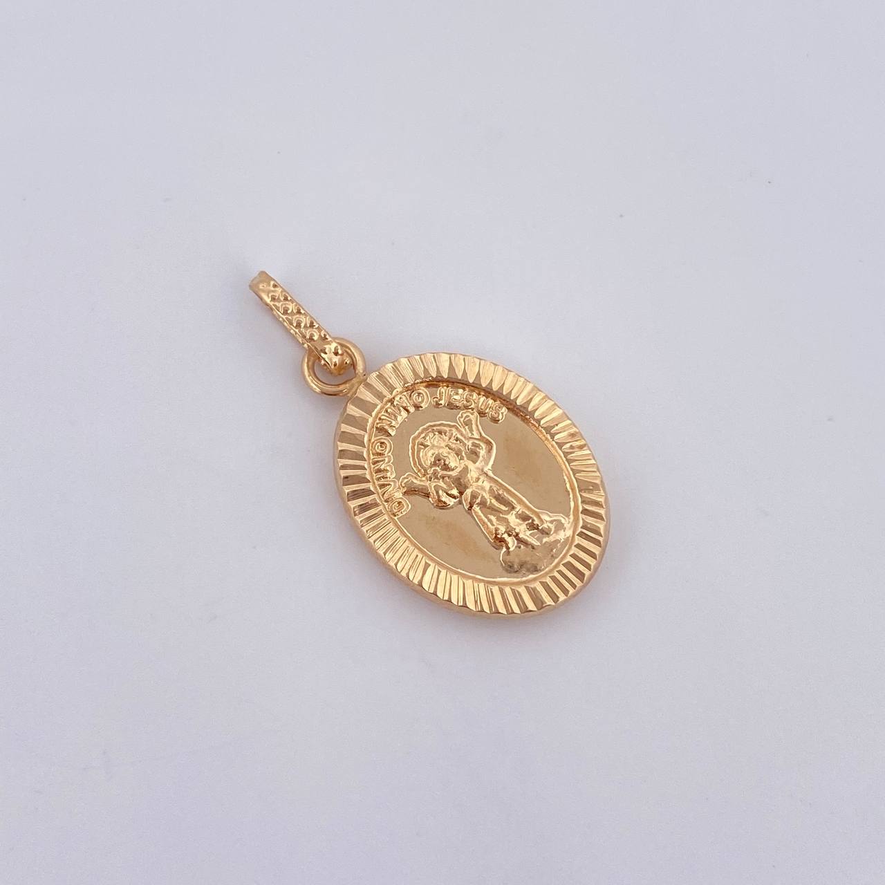 Dije Divinio Niño 1.15gr / 2.4cm / Oro 18K $