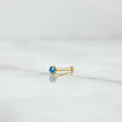 Piercing Chispa Fija Bisel 0.1gr / 1cm / Circon Azul Celeste Mate Oro Amarillo 18K (Joya)