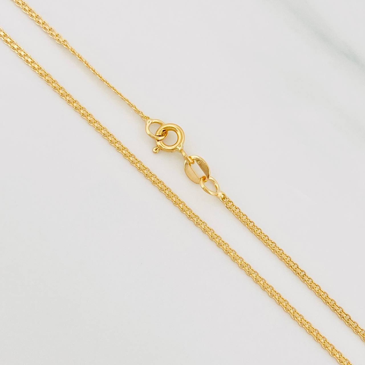 Cadena China 3.3g / 60cm / 1.37mm Oro Amarillo 18K