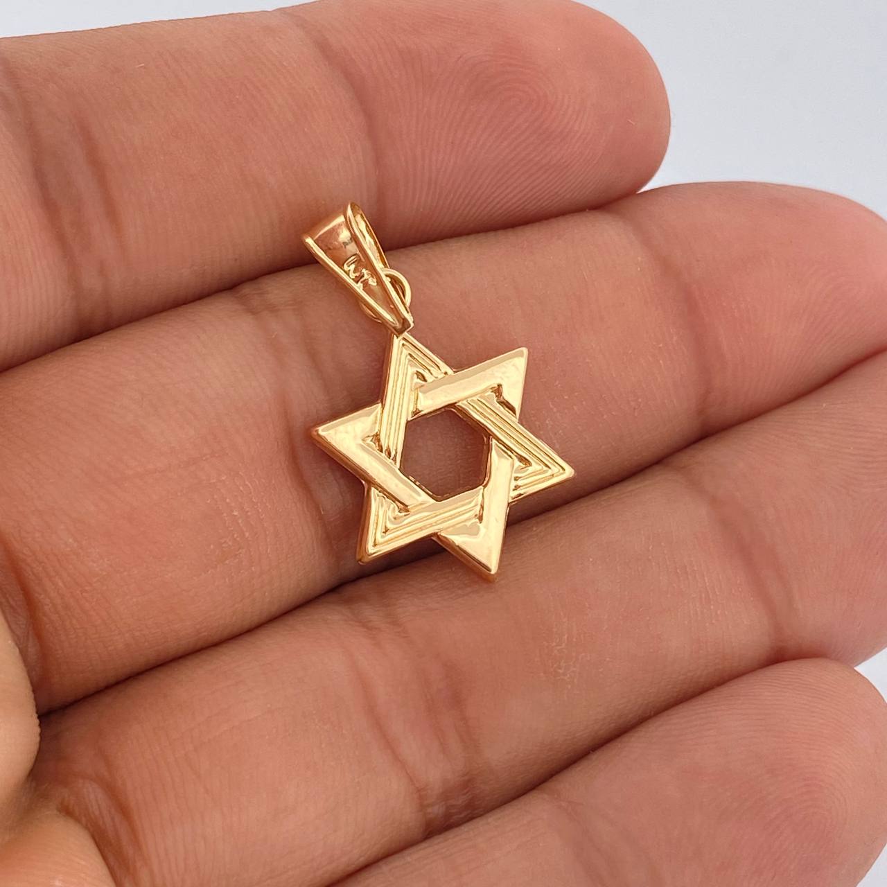 Dije Estrella de David 1.1gr / 2.8cm / Oro Amarillo 18K %