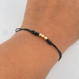 Pulsera Negra 0.15gr / 3mm Bolas Lisas 3und Oro Amarillo 18K (A.C)
