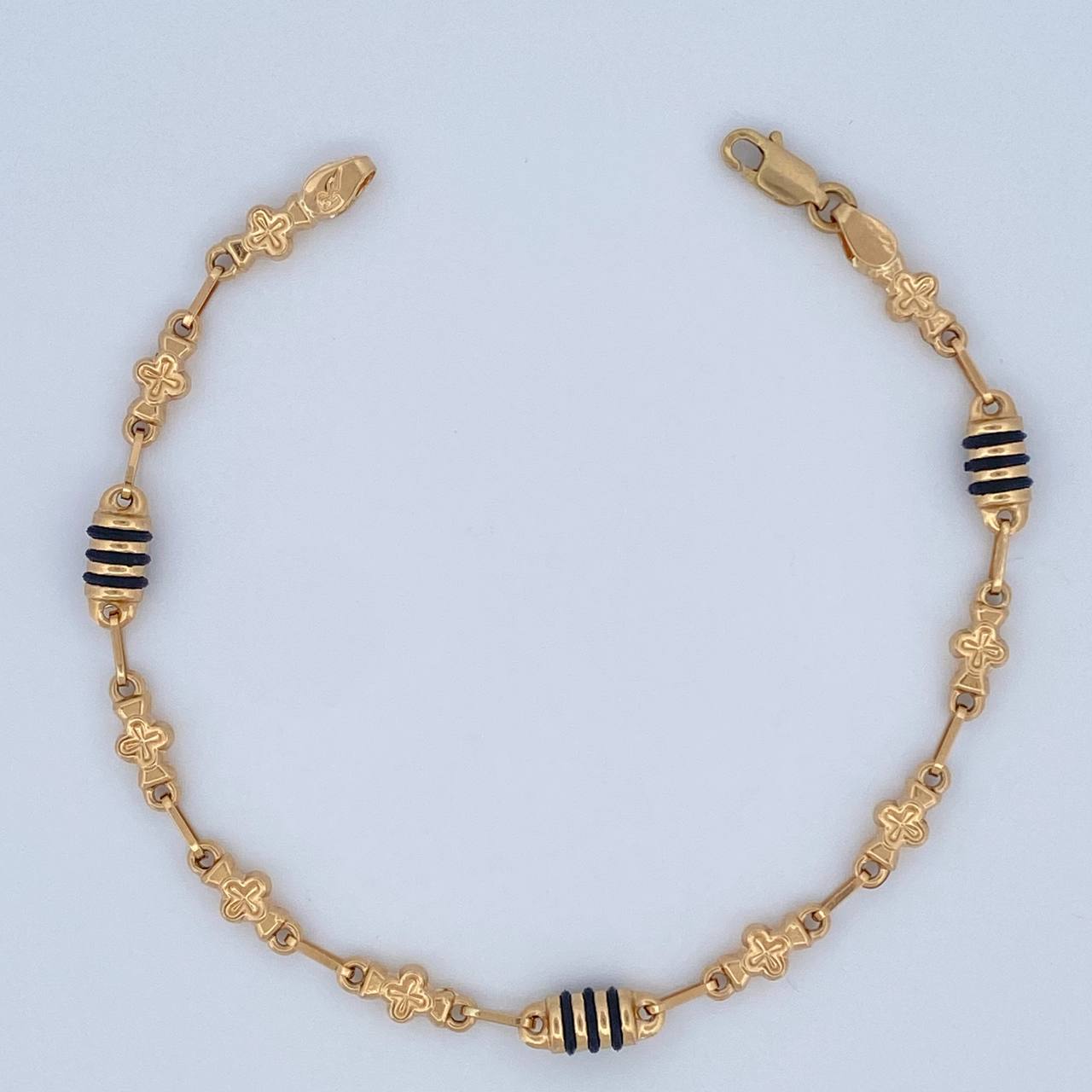 Pulso Rustico Flores 4.4gr / 21cm / Oro 18K $