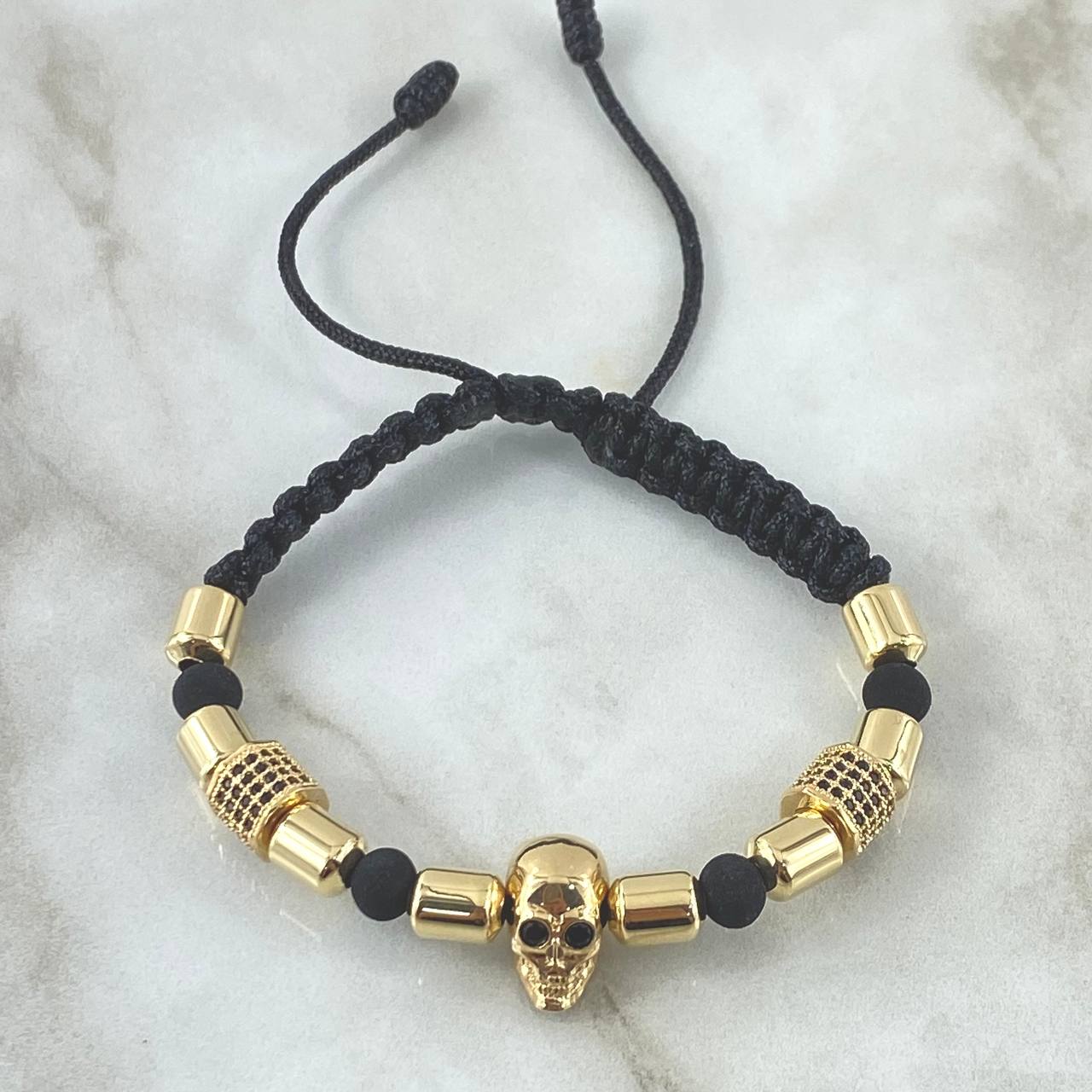 Pulsera Negra Herraje Calavera Cilindro de Fuego 7.7gr / 6mm Cilindros Lisos 10und Neoprenos Oro Amarillo 18K *