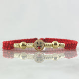 Pulsera Roja Herraje Emoji Lengua Afuera 1.9gr / 6mm Bolas Lisas 2und Cilindros Diamantados 4und Oro Amarillo 18K ©
