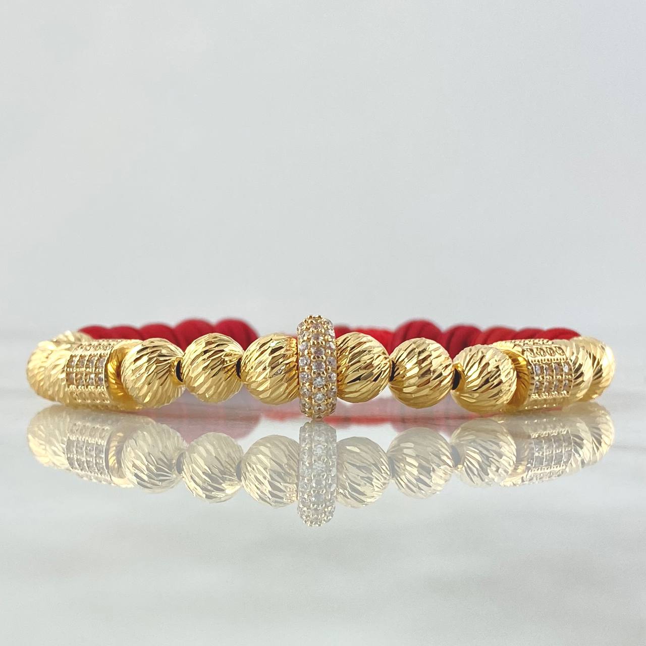 Pulsera Roja Dona Cilindros de Fuego 7.9gr / 7mm Bolas Diamantadas 12und Neoprenos Circones Blancos Oro Amarillo 18K ©