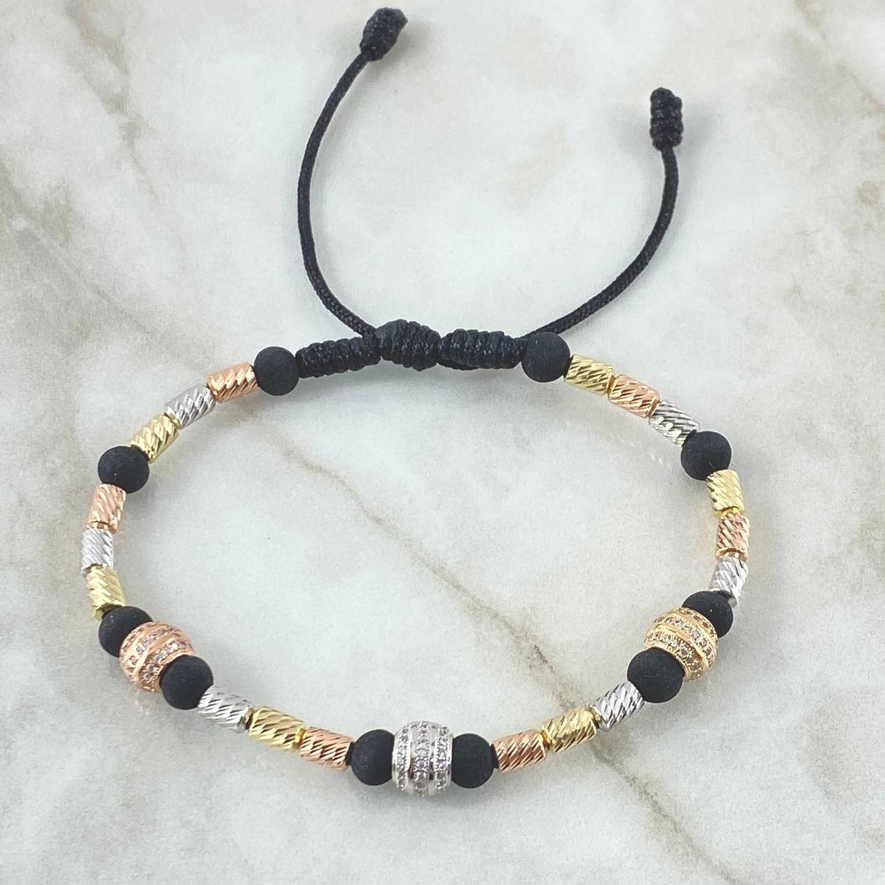Pulsera Negra Bolas de Fuego Doble Linea 6.6gr / 3mm Cilindros Diamantados 18und Circones Blancos Tres Oros 18K ©