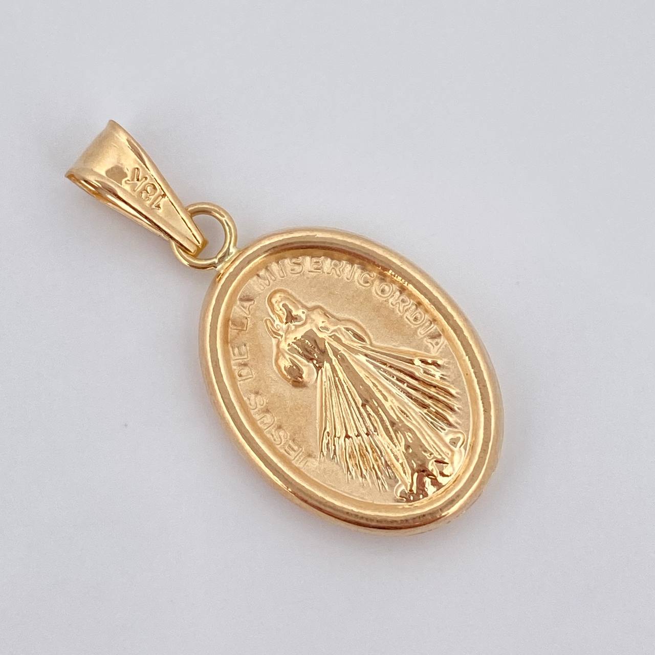 Dije Jesus de la Misericordia 1.55gr / 3cm / Oro 18K $