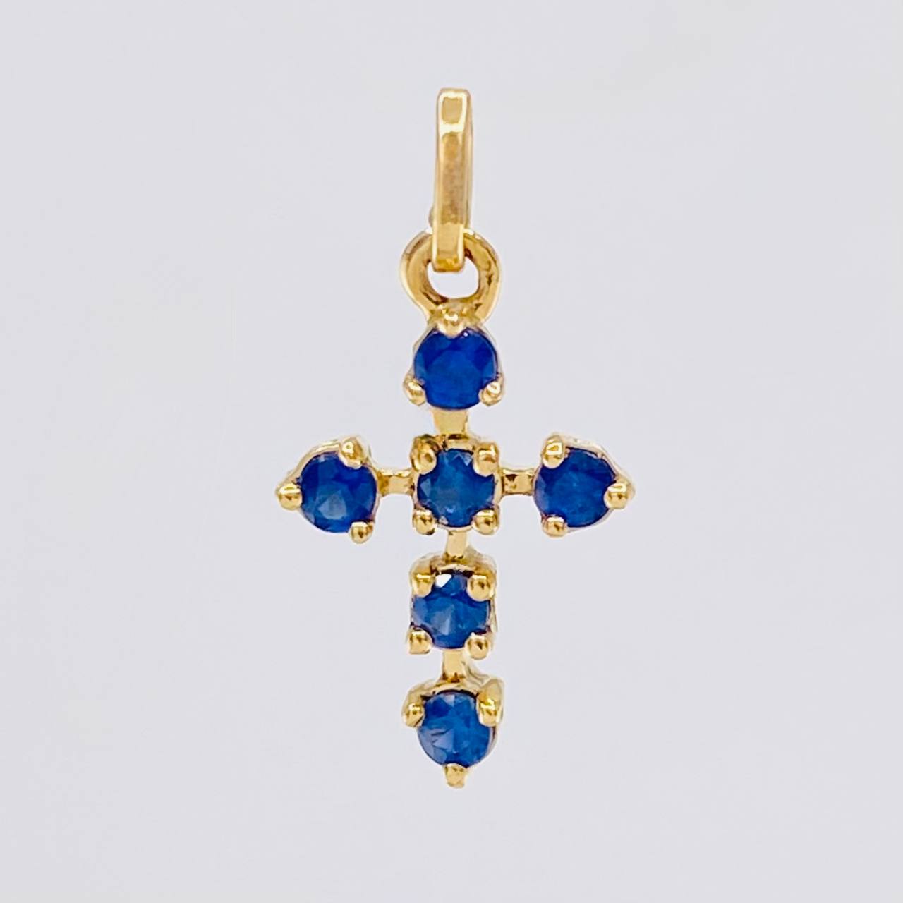 Dije Cruz Burbuja Zafiros 25pts 0.6g / 1.5cm Oro Amarillo 18K