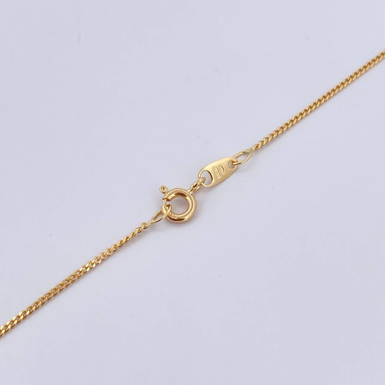 Cadena Mini Cubana 2.4gr / 45.7cm / 1.1mm Oro Amarillo +1 18K $