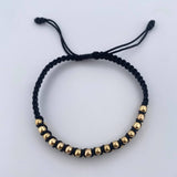 Pulsera Negra 1.55gr / 3mm Bolas Lisas Oro Amarillo 18K (A.C)