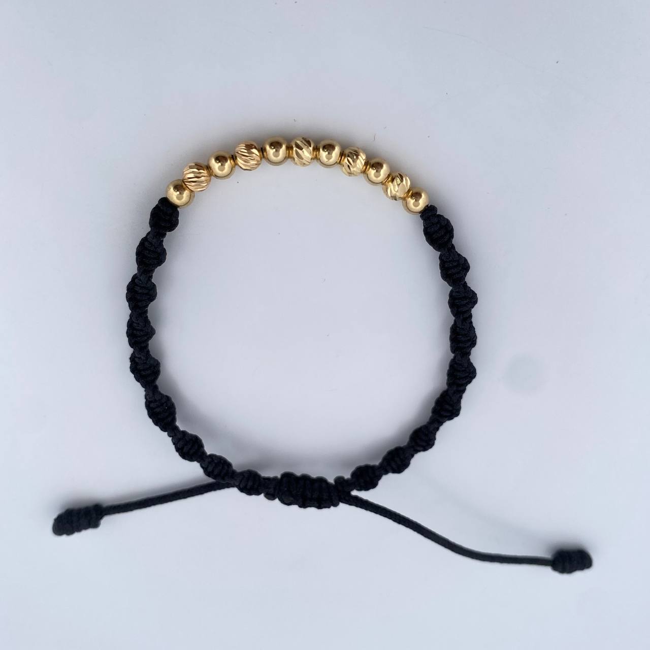 Pulsera Negra 1.2gr / 4mm Bolas Lisas Diamantada Oro Amarillo 18K (A.C)