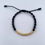 Pulsera Negra 1.2gr / 4mm Bolas Lisas Diamantada Oro Amarillo 18K (A.C)