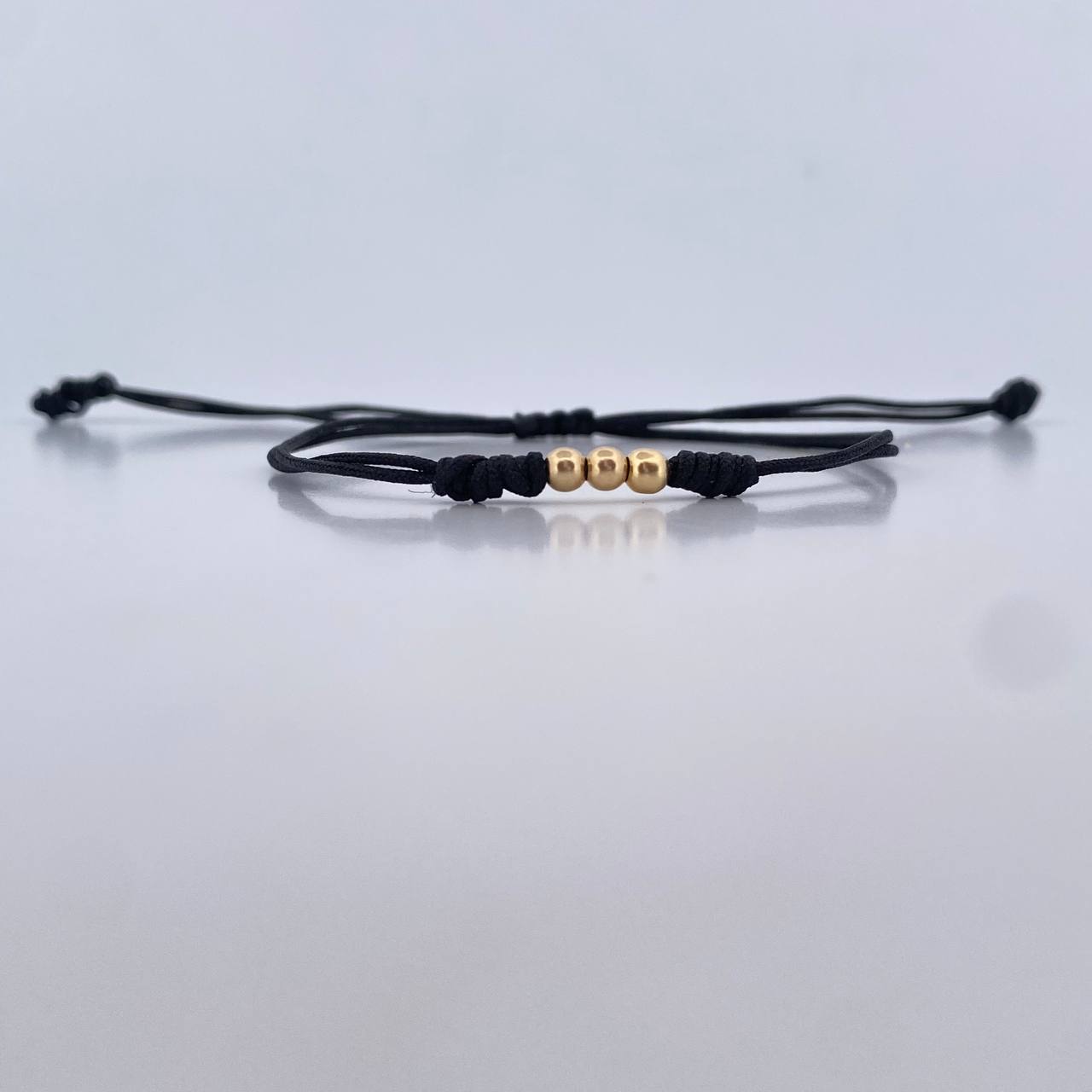 Pulsera Negra 0.15gr / 3mm Bolas Lisas 3und Oro Amarillo 18K (A.C)