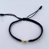 Pulsera Negra Letra X 0.4gr / Oro Amarillo 18K &