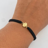 Pulsera Negra Virgen Milagrosa 0.3gr / Oro Amarillo 18K &