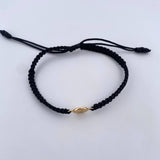 Pulsera Negra Divino Niño 0.45gr / Oro Amarillo 18K &