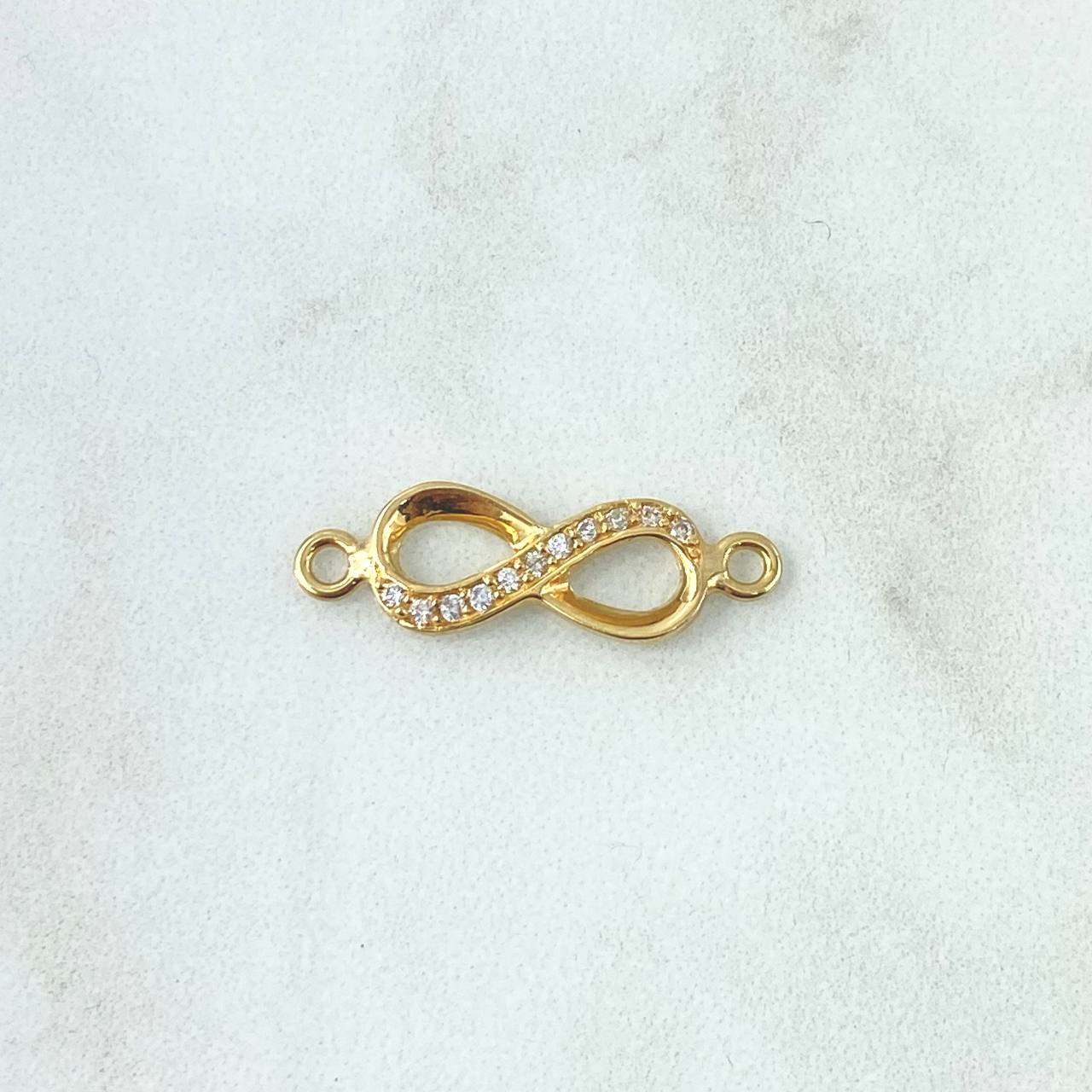 Herraje Infinito Medio Basteado 1.2gr / 2.4cm / Circones Blancos Oro Amarillo 18K