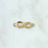 Herraje Infinito Medio Basteado 1.2gr / 2.4cm / Circones Blancos Oro Amarillo 18K