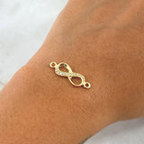 Herraje Infinito Medio Basteado 1.2gr / 2.4cm / Circones Blancos Oro Amarillo 18K