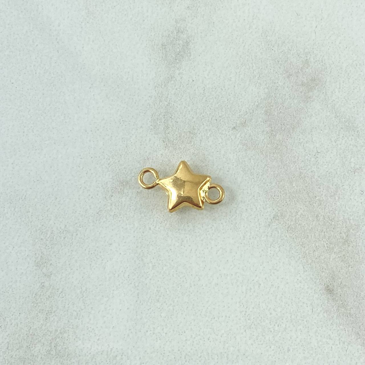 Herraje Estrella Troquelada 0.3gr / 1.3cm / Oro Amarillo 18K ©