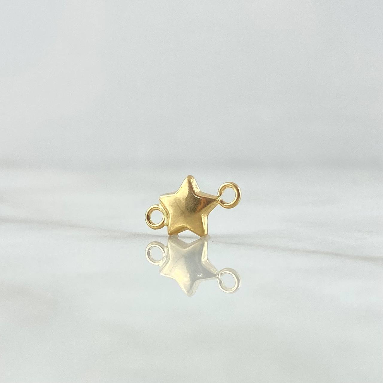 Herraje Estrella Troquelada 0.3gr / 1.3cm / Oro Amarillo 18K ©