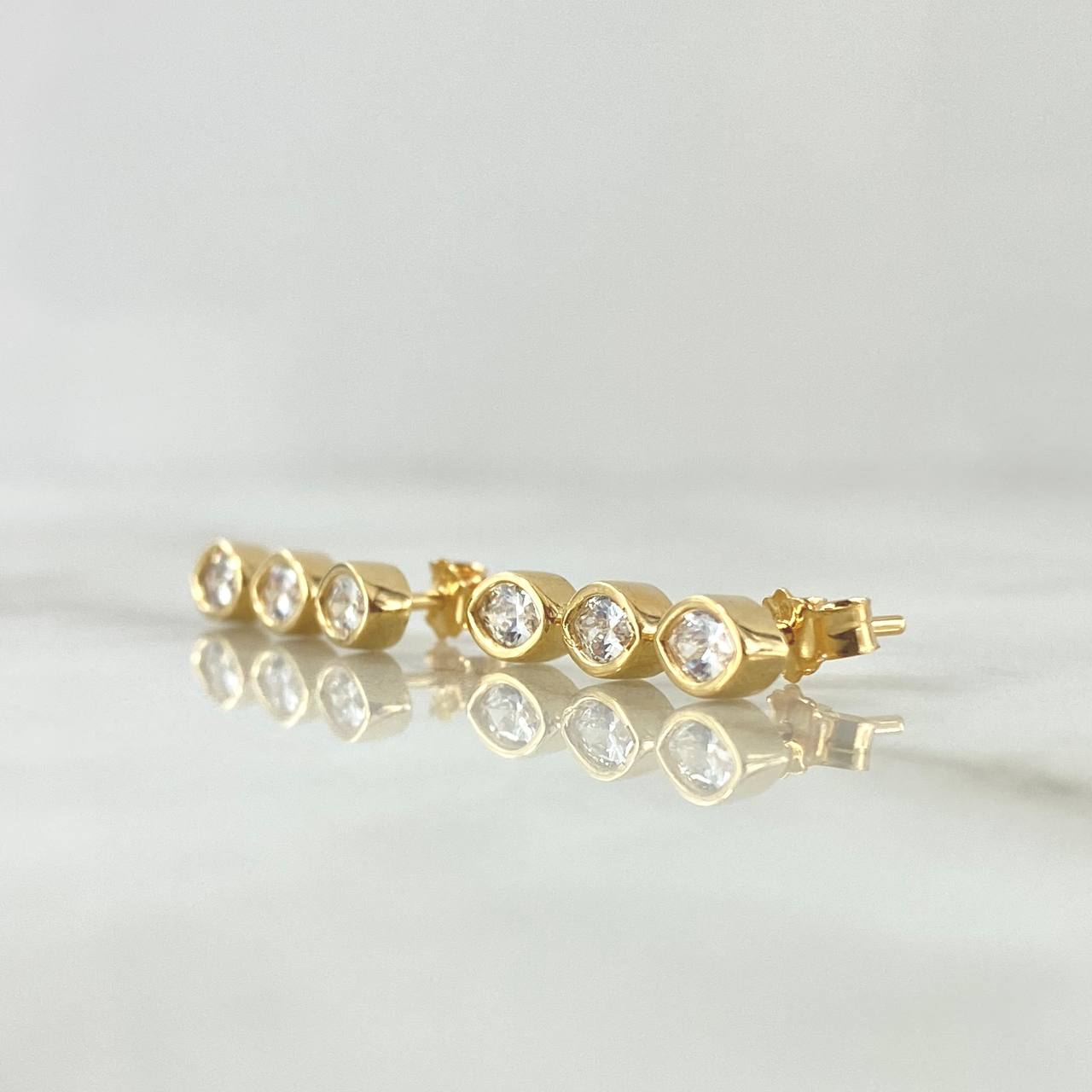 Topos Trio De Ojos 3.3gr / 2.1cm / Circones Blancos  Oro Amarillo 18K ©