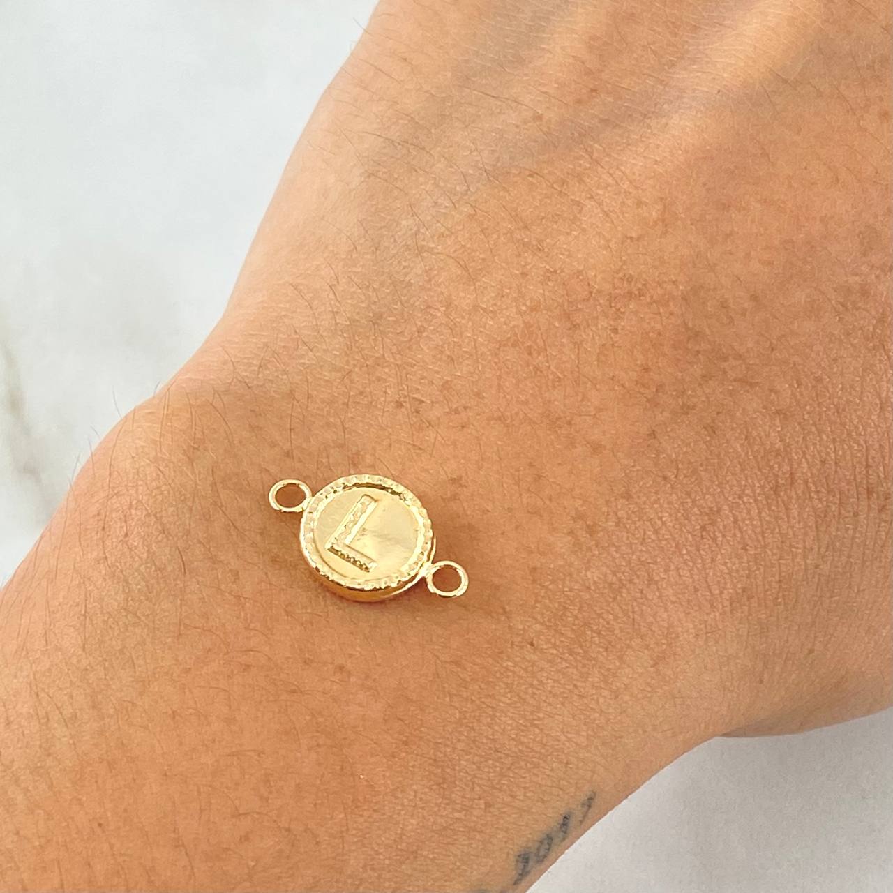 Herraje Letra L 0.6gr / 1.7cm / Oro 18K