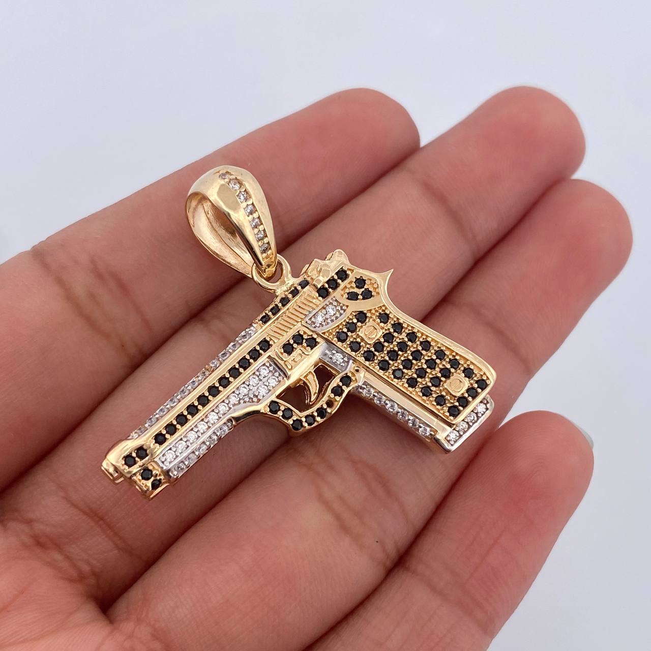 Dije Pistola 11.8gr / 3.4cm / Oro 18K $