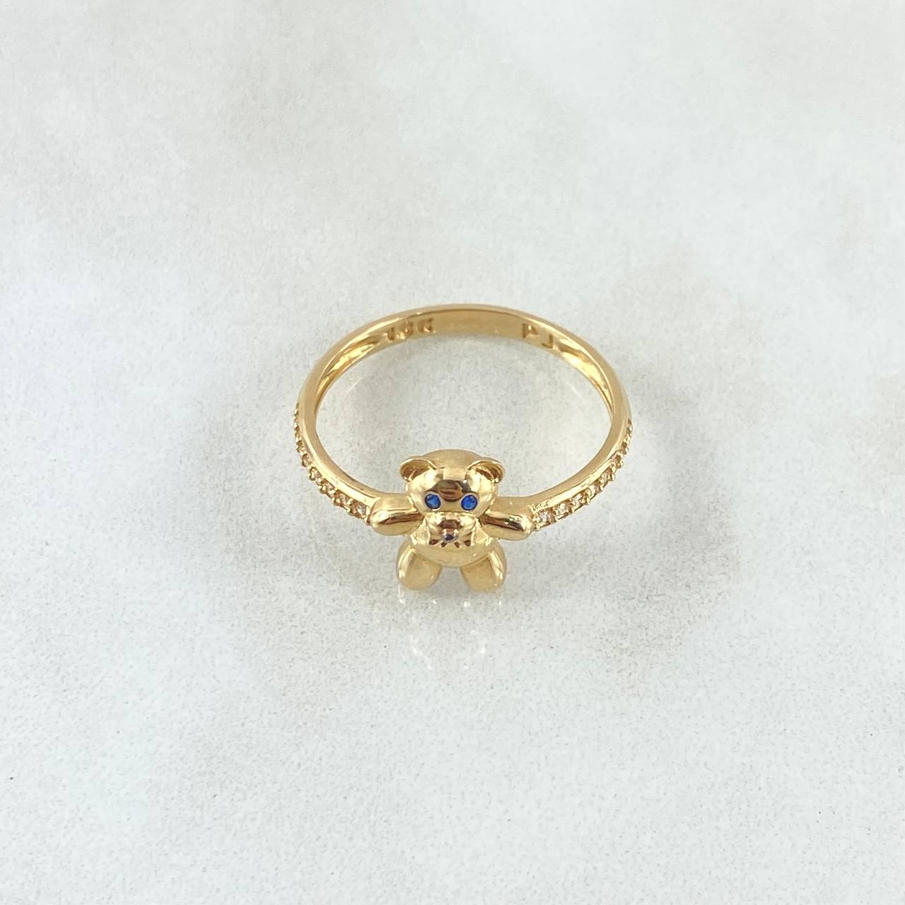 Anillo Oso En Media Churumbela 2.4gr / T7 1/2 / Ojos Azules Circones blancos Oro Amarillo 18K *