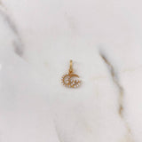 Dije GG 0.55gr / 1.4cm / Circones Blancos Oro Amarillo 18K $