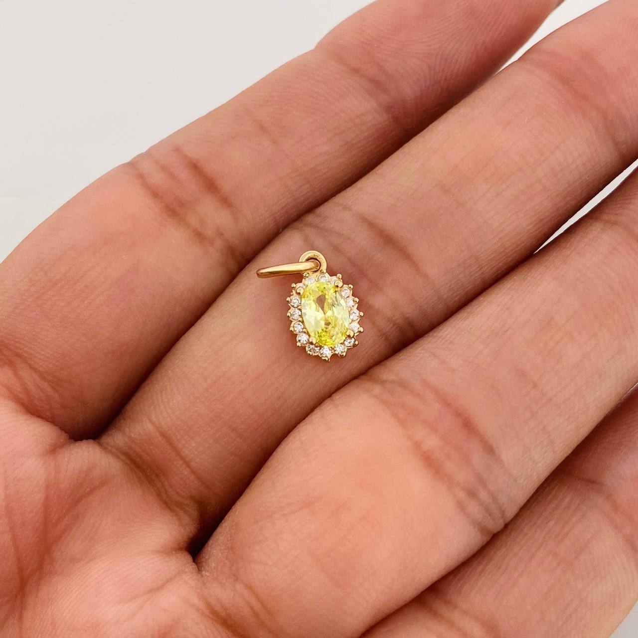 Dije Ovalo Halo 0.7g / 1.4cm Oro Amarillo 18K