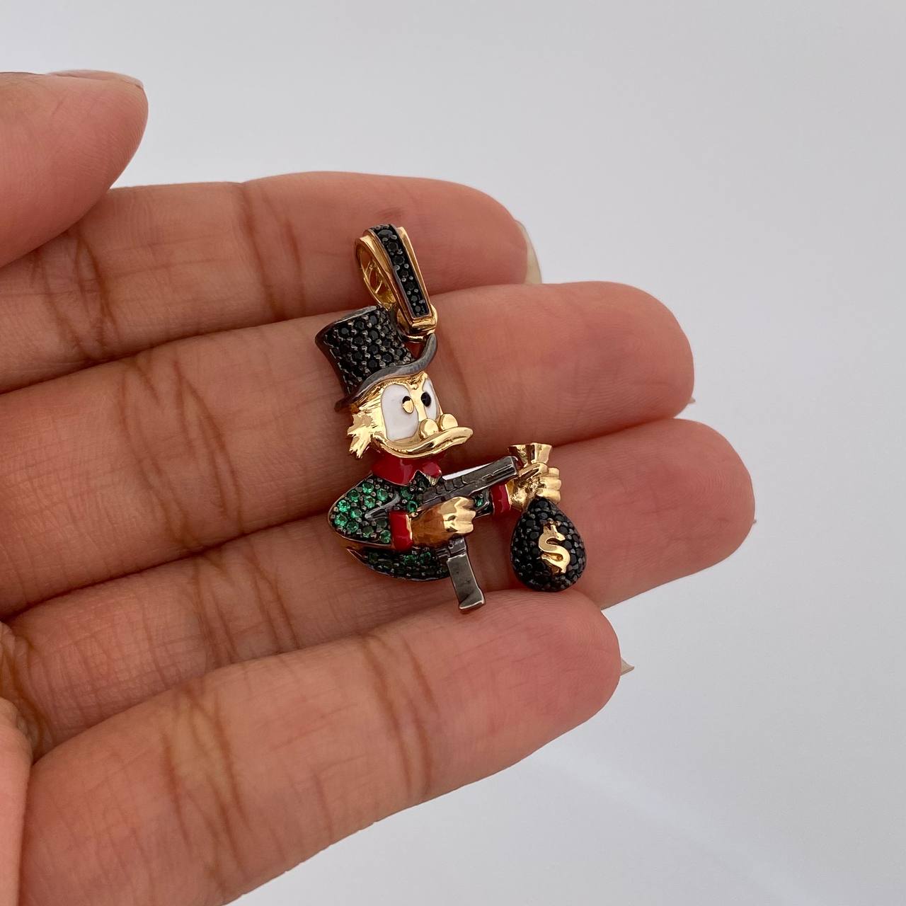 Dije Pato Pistola 6gr / 3.4cm Dos Oros Negro Amarillo 18K $