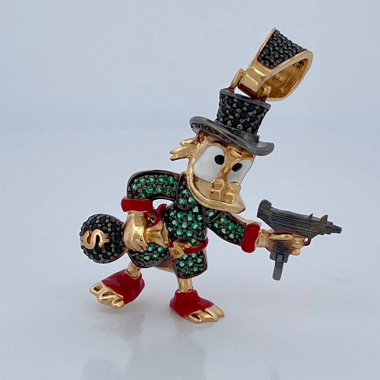 Dije Pato Pistola 10.2gr / 4.3cm Dos Oros Negro Amarillo 18K $