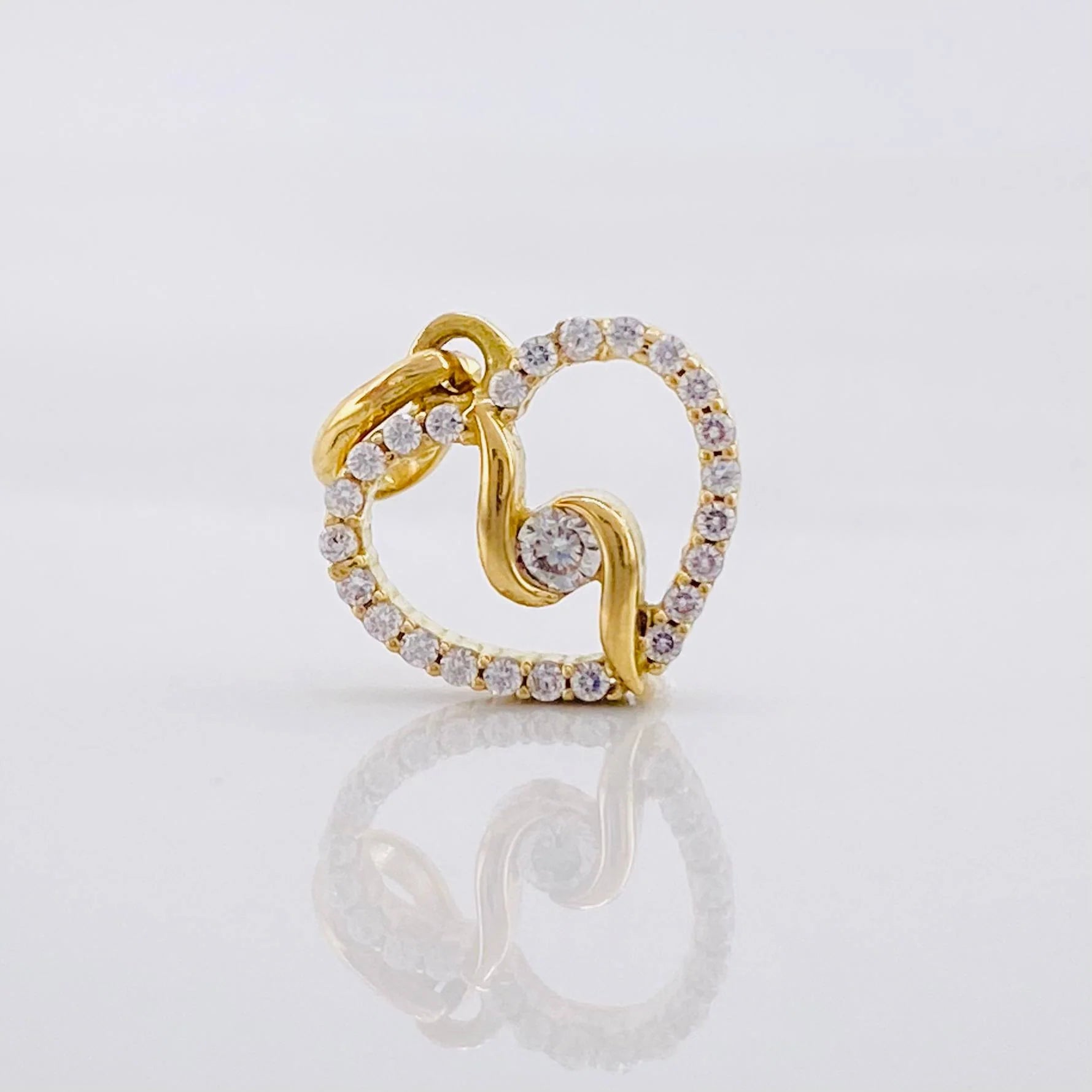 Dije Silueta Espiral 0.9g / 1.3cm Oro Amarillo 18K